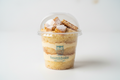 create a vanilla cake with crunch vanilla cookie and sigh 5oz cup with lids and add my logo 